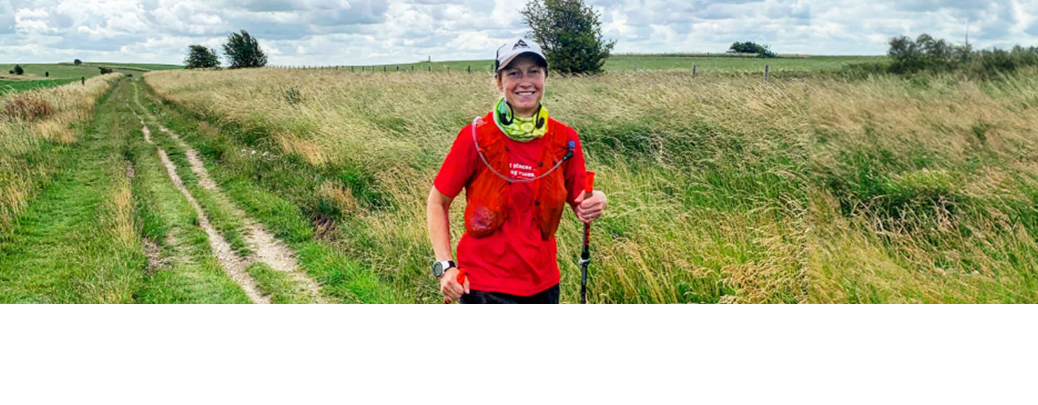 Karin Voller on a walk through a grassy field 