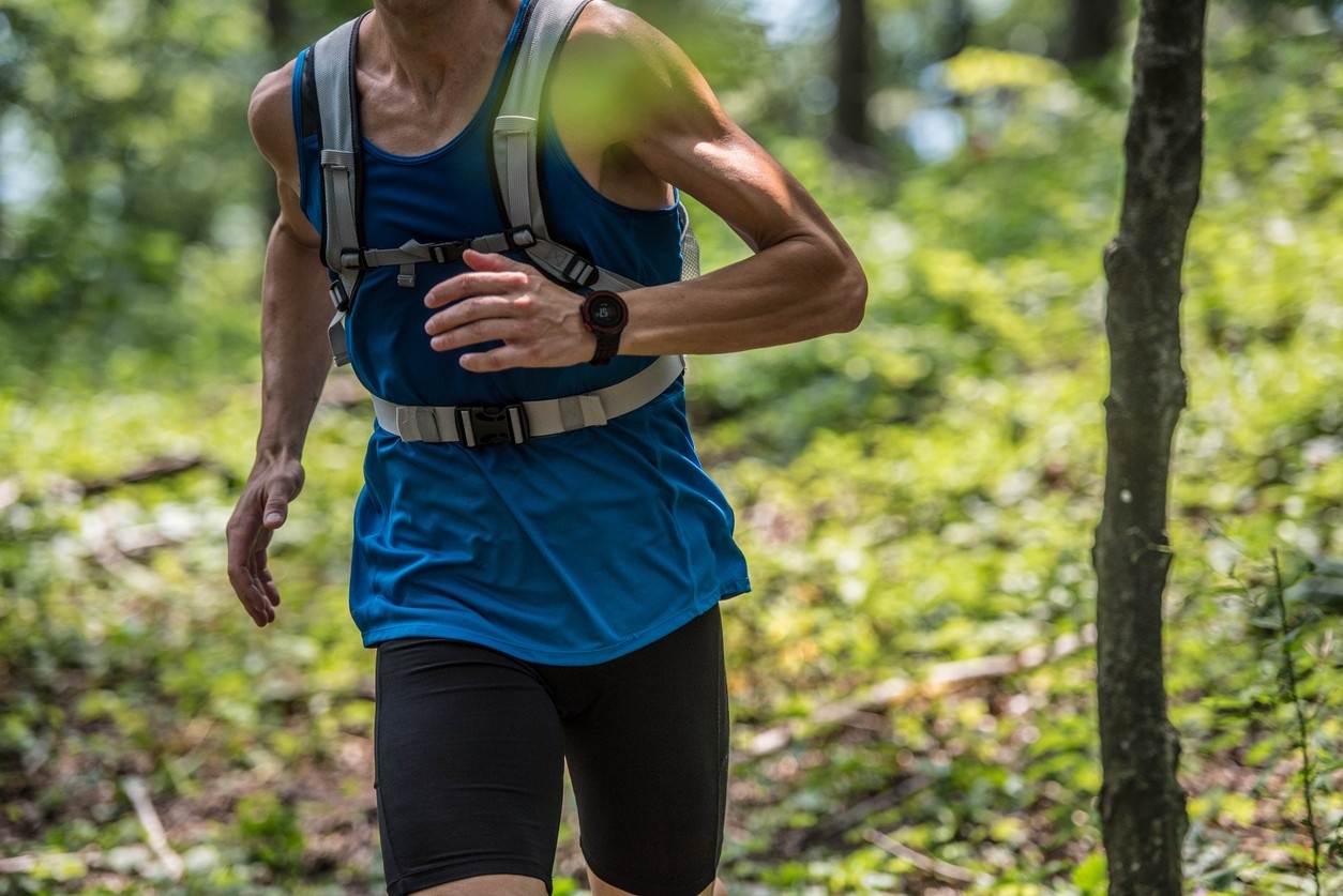 Man running with a running vest