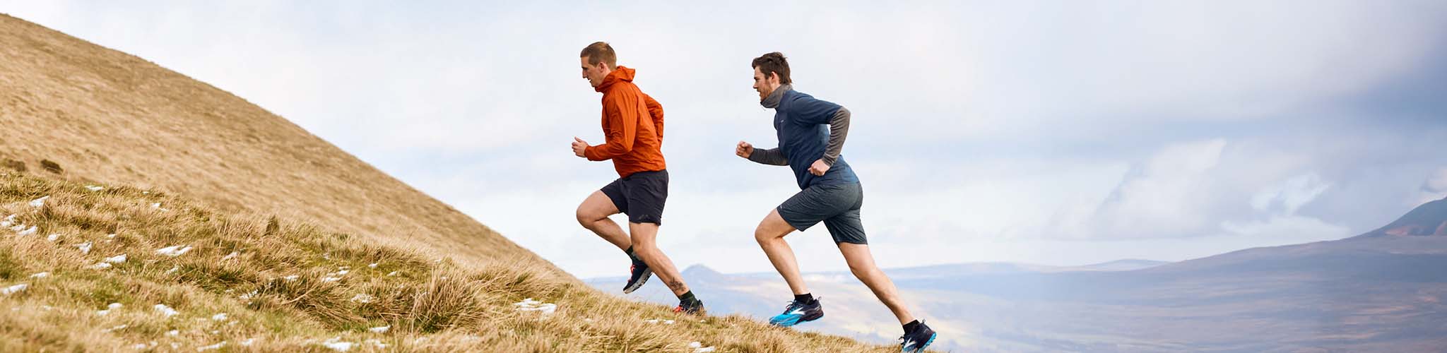 Shop trail. Two men running on a trail. 