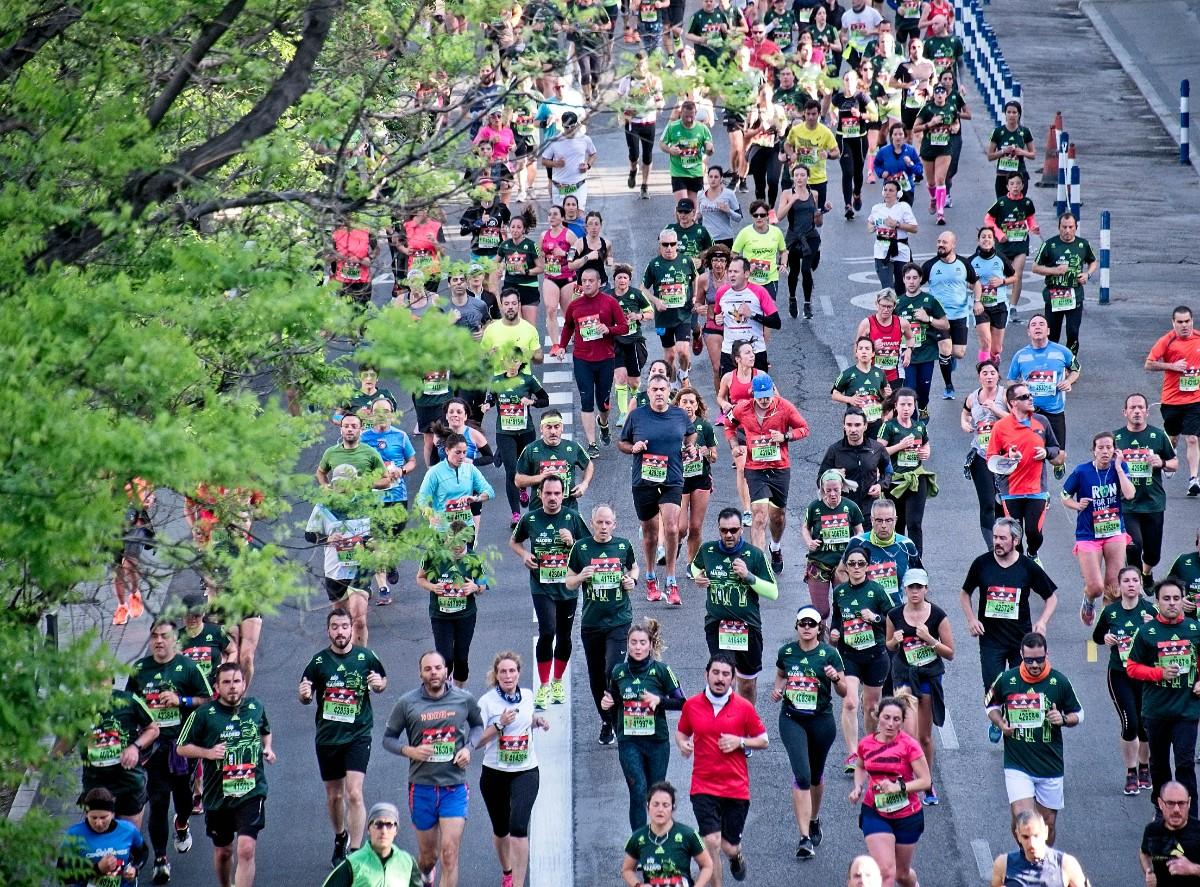 An aerial image of people running the Boston Marathon