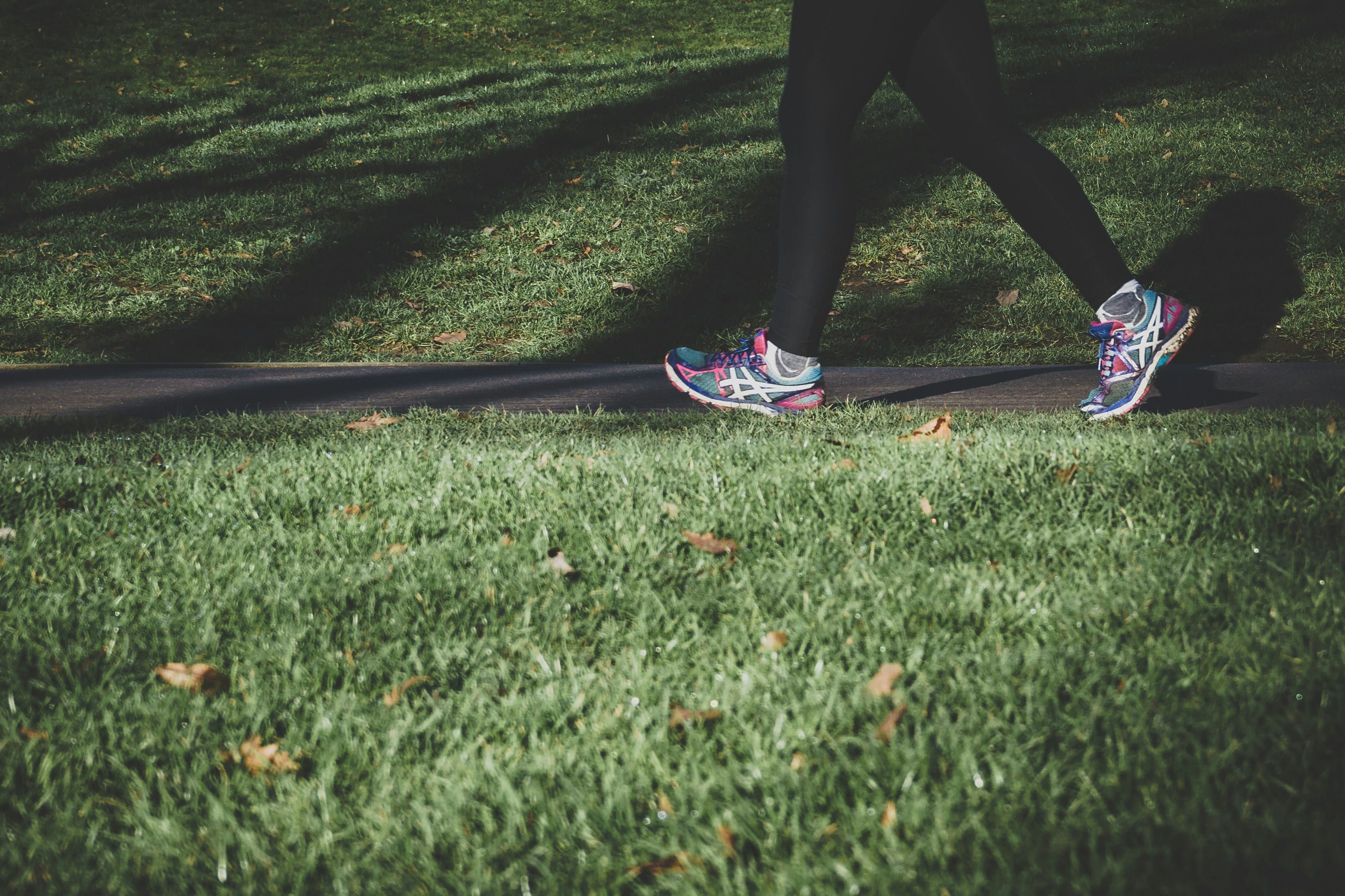 An image of a person running through a London Park 