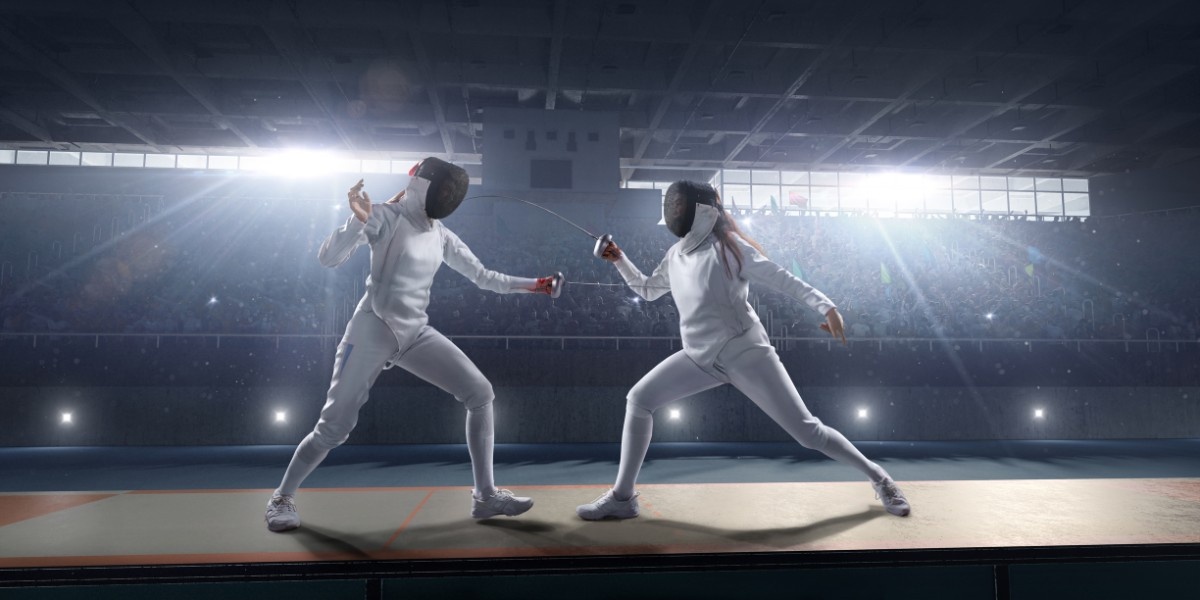 Two women fencing