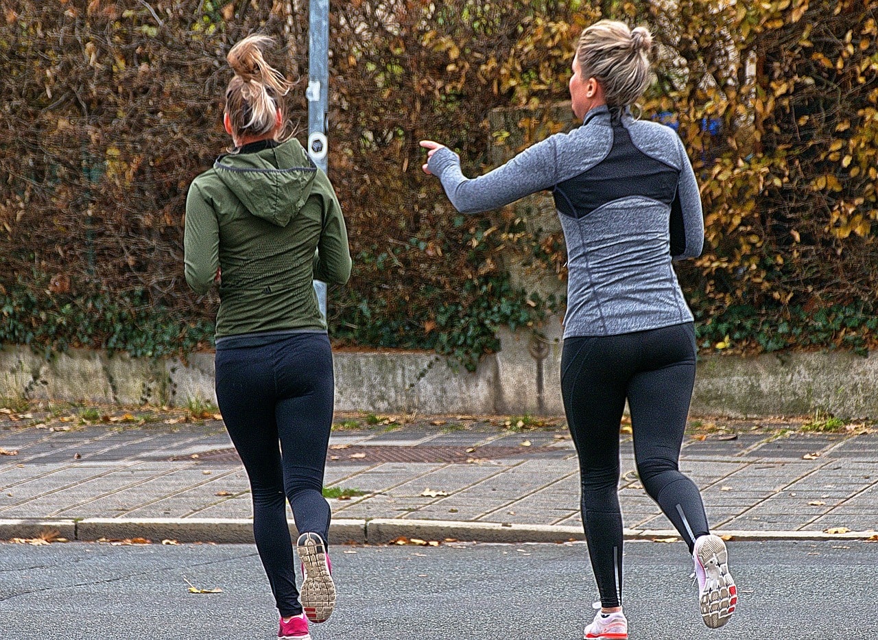 An image of two women running 