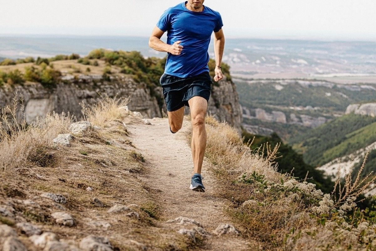 A trail runner in shorts