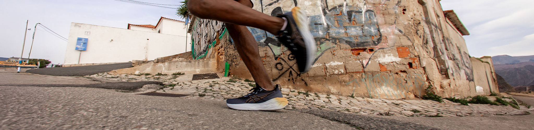 Shop new season Shoes. A man running on a street