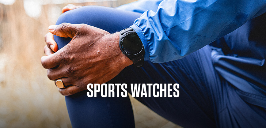 Shop sports watches. A perarson doing stretches before a run wearing sparts watch on their wrist